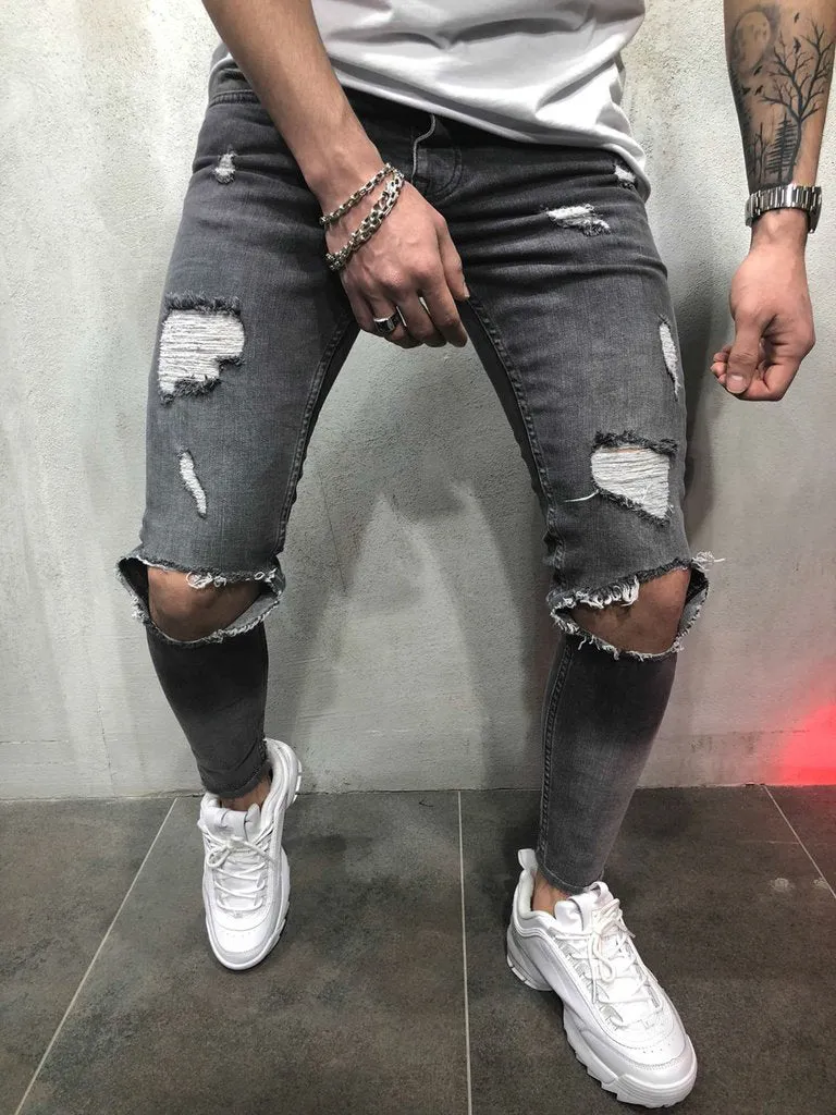 Men's light blue straight fit jeans with worn and embroidered detailing, five-point length, mid-rise waist