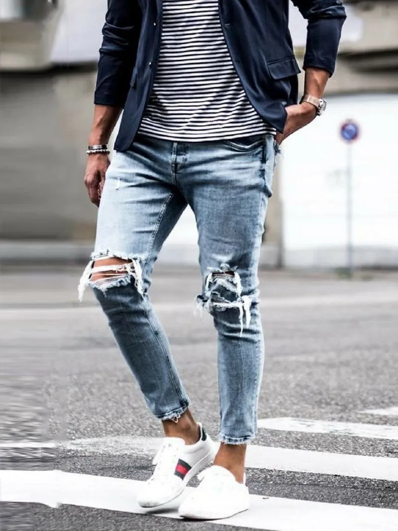 Men's light blue straight fit jeans with worn and embroidered detailing, five-point length, mid-rise waist