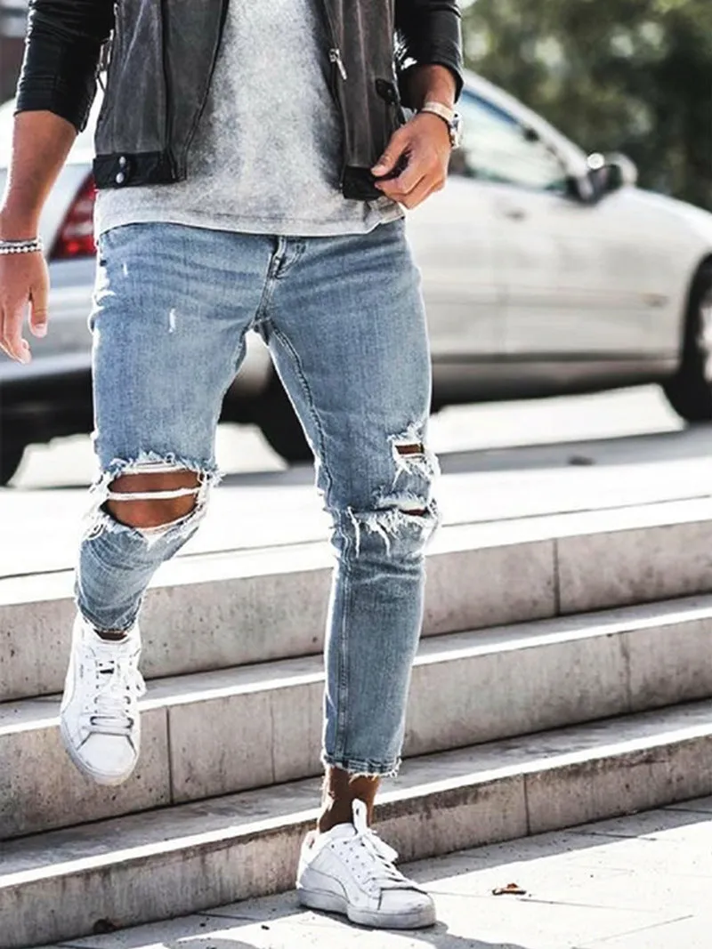 Men's light blue straight fit jeans with worn and embroidered detailing, five-point length, mid-rise waist
