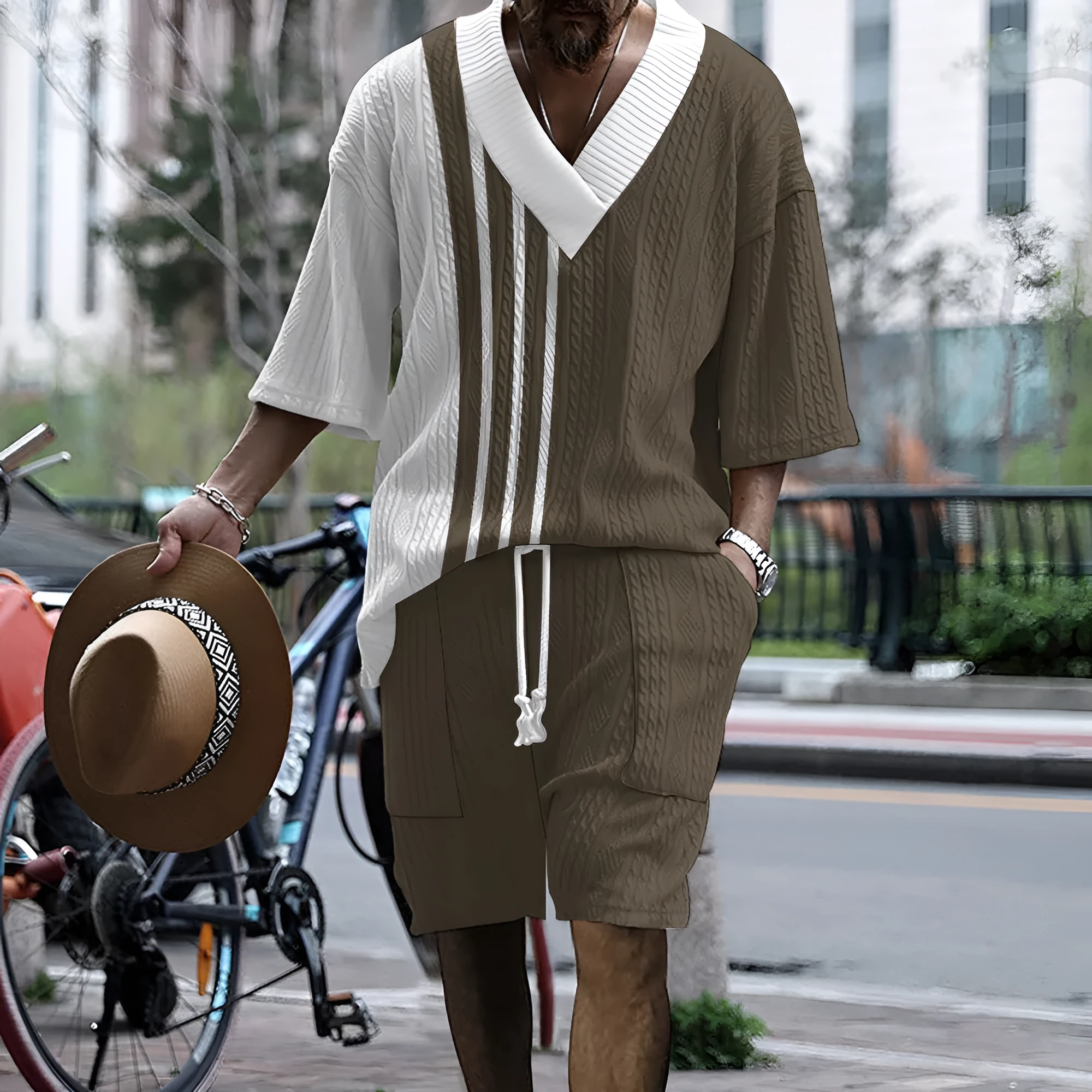Men's grey printed drop-shoulder knitted short-sleeve top with matching shorts, a casual tracksuit set.