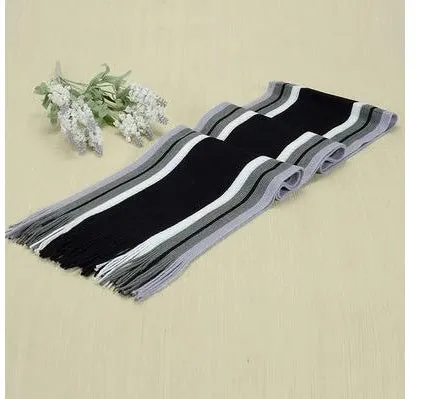Fringed cotton scarf in solid colour with stripe pattern, 180cm length, 23cm width, laid flat on neutral background