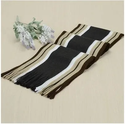 Fringed cotton scarf in solid colour with stripe pattern, 180cm length, 23cm width, laid flat on neutral background