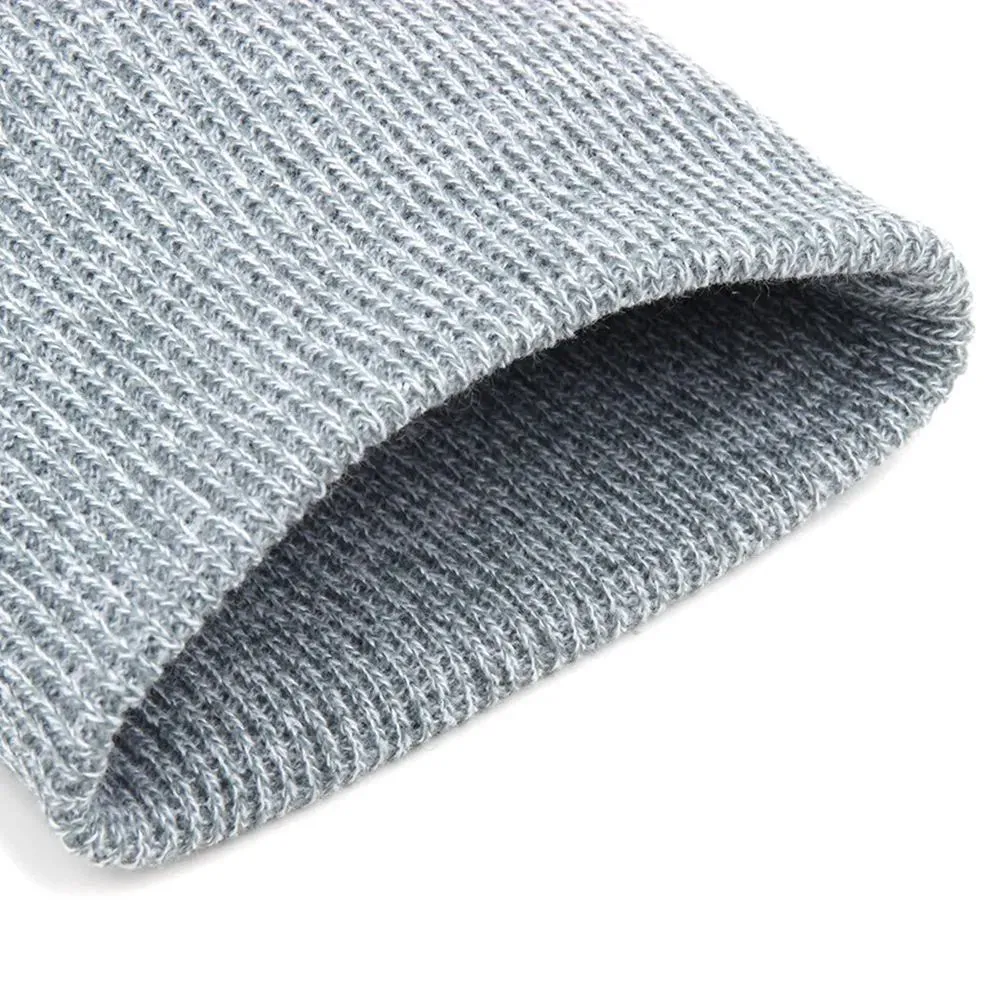 Unisex knitted acrylic beanie in army green on a white background, stretchy 55–60cm fit for outdoor winter use