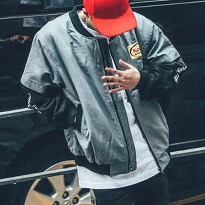 Hip hop style unisex cotton baseball jacket in grey with round neck and side slit pockets