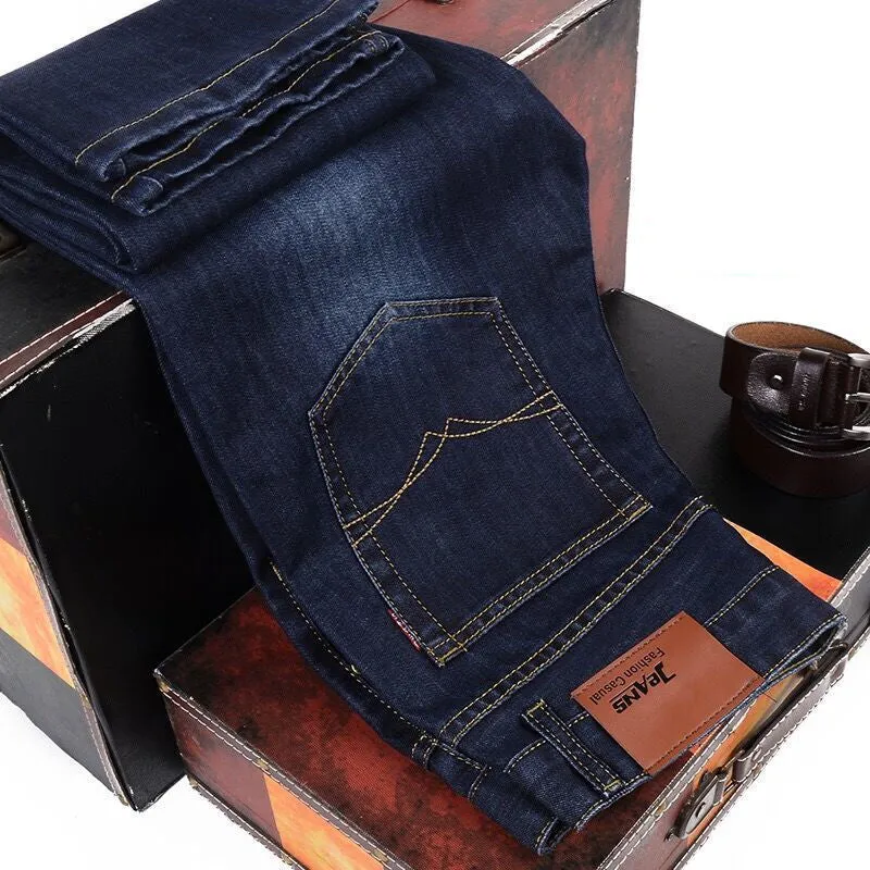 Men's loose straight casual work stretch jeans in blue elastic option with mid-waist and straight leg