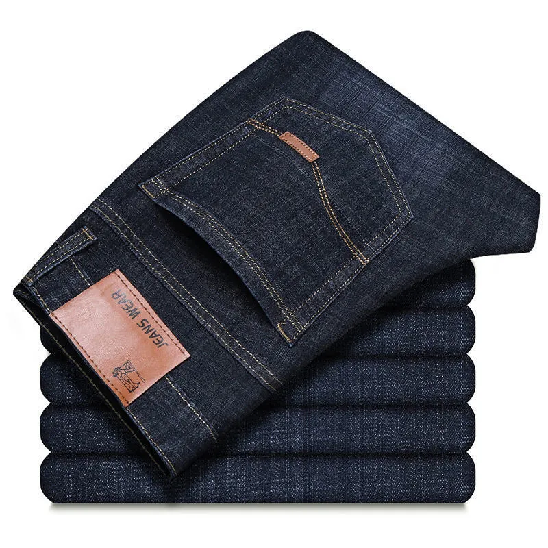 Men's loose straight casual work stretch jeans in blue elastic option with mid-waist and straight leg