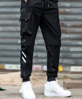 Men's straight-leg casual trousers in black nylon blend fabric with micro-elastic waist on a plain background
