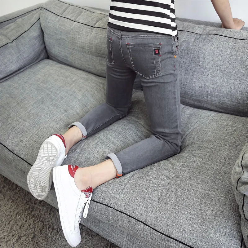 Men's autumn black ripped ankle jeans with micro elastic denim, youth-style tapered fit
