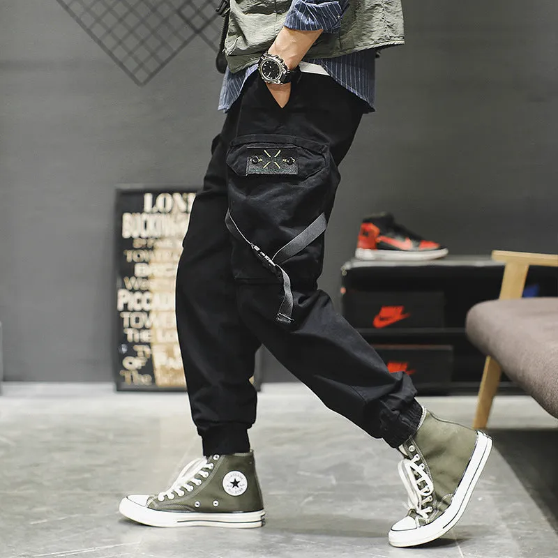 Men's cotton cargo pants in grey with multiple pockets, regular fit, side view