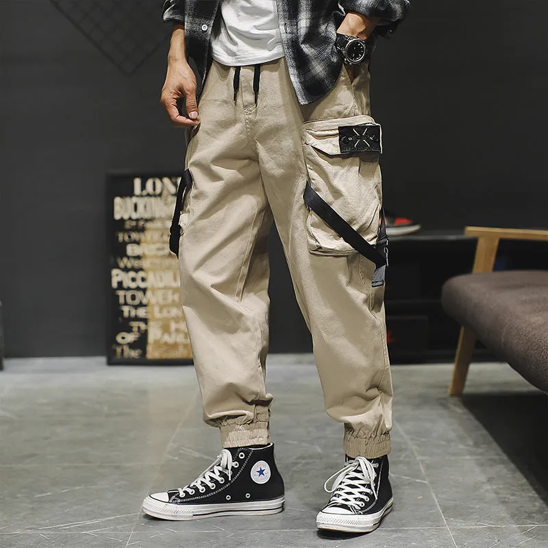Men's cotton cargo pants in grey with multiple pockets, regular fit, side view
