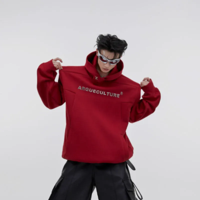 A red men's loose hooded sweater with heavy shoulder pads and a three-dimensional printed pattern.