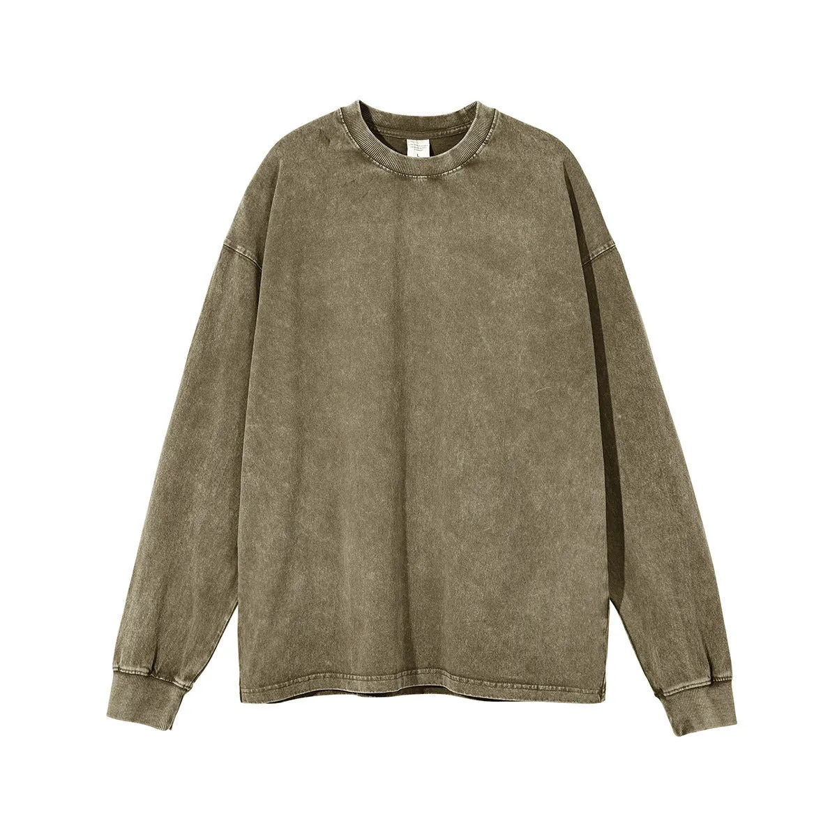 Man wearing a loose-fit batik print long sleeve cotton pullover top in a vintage washed colour.