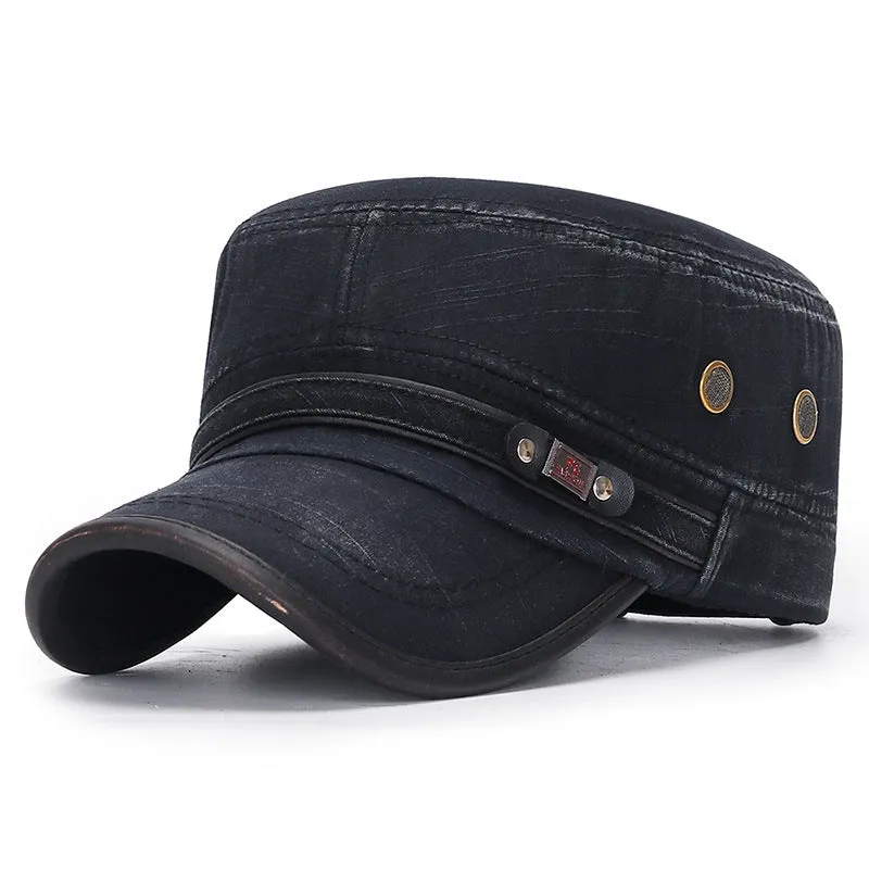 Distressed flat-top leather-trimmed cotton hat in army green on neutral background