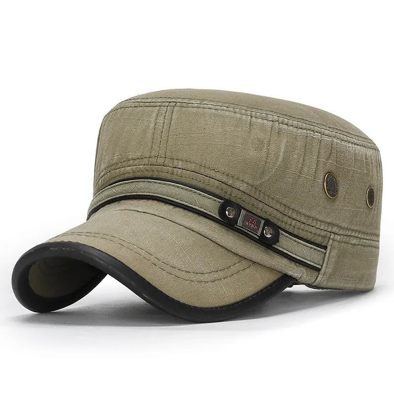 Distressed flat-top leather-trimmed cotton hat in army green on neutral background