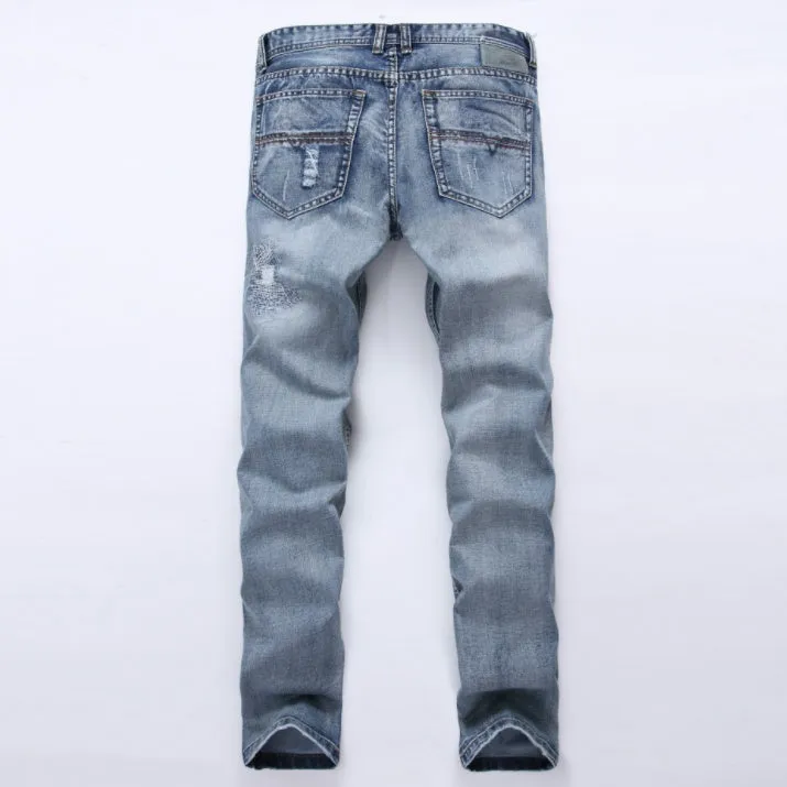 Mens light blue ripped slim fit jeans with distressed denim
