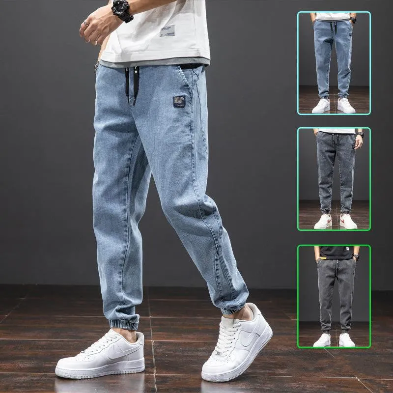 Men's casual loose stretch cotton jeans in black, available in sizes M to 8XL for relaxed daily wear