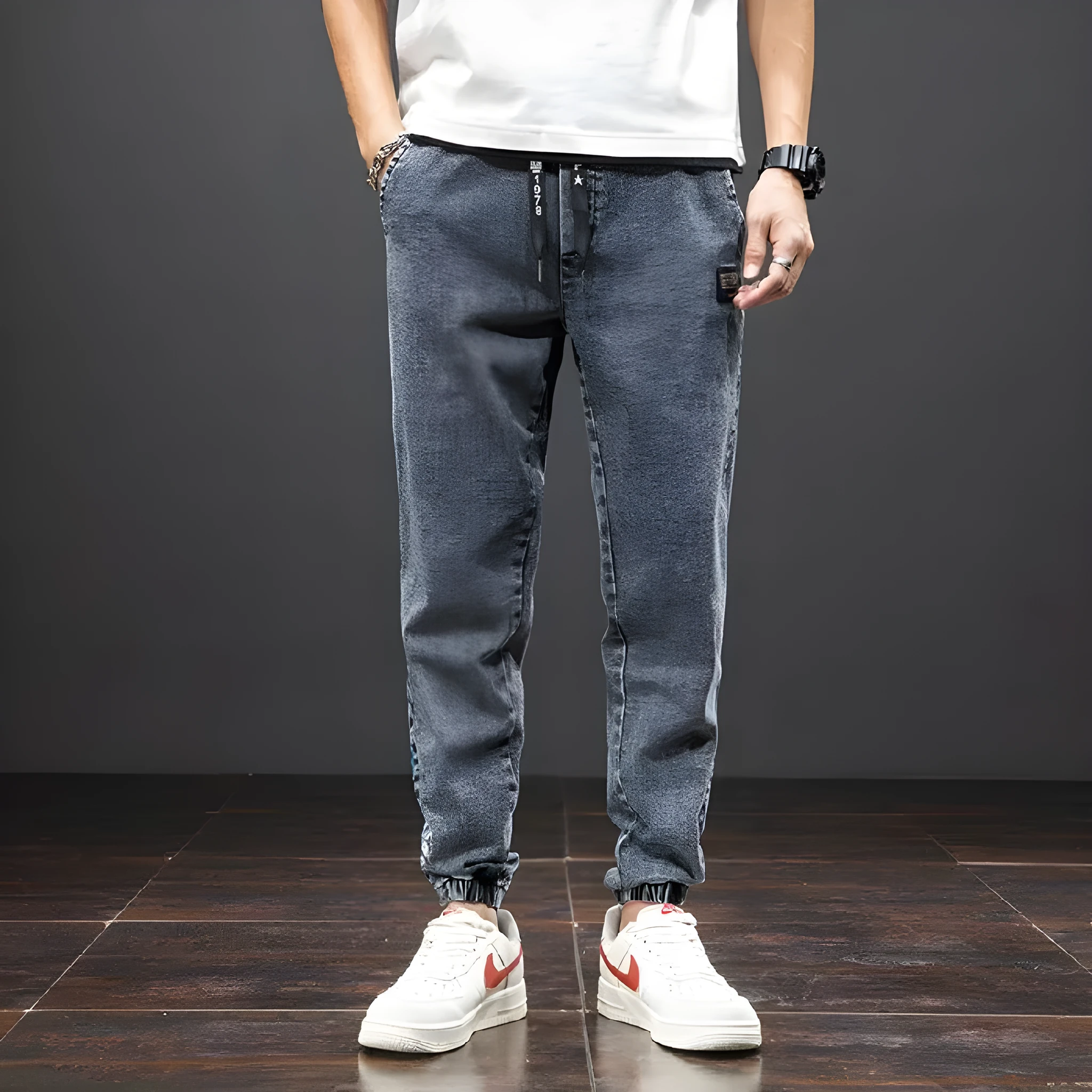 Men's casual loose stretch cotton jeans in black, available in sizes M to 8XL for relaxed daily wear