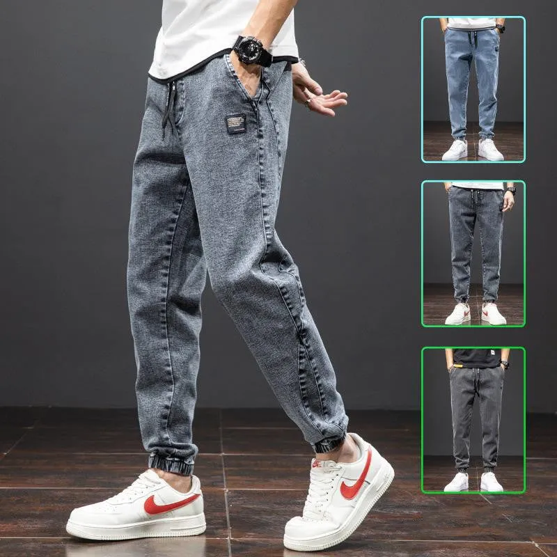 Men's casual loose stretch cotton jeans in black, available in sizes M to 8XL for relaxed daily wear