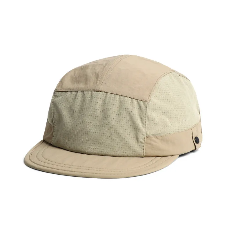 Polyester bucket hat in army green with a soft front brim and dome crown on a wooden background.