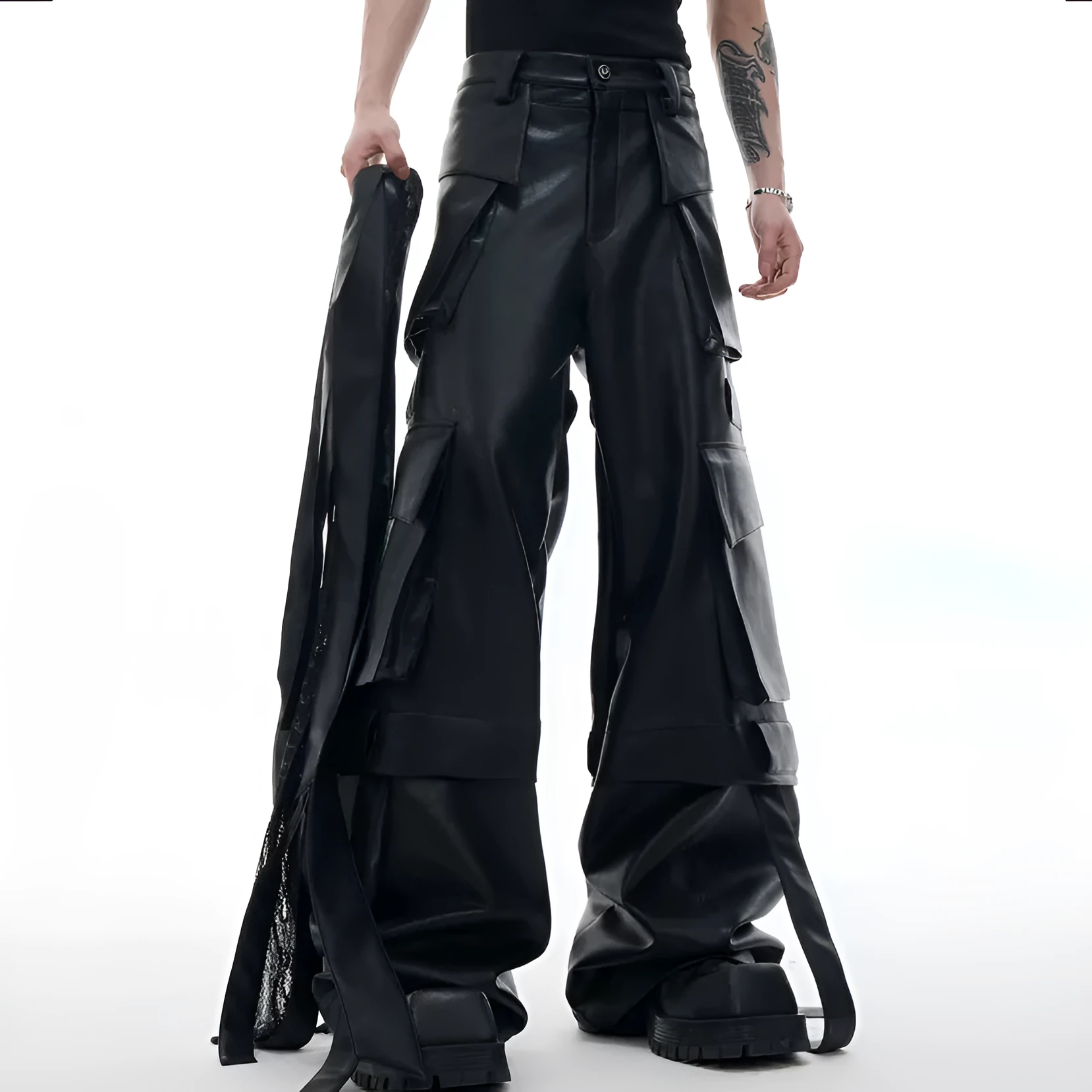 Black quilted loose-fit trousers with multiple pockets and leather-like appearance