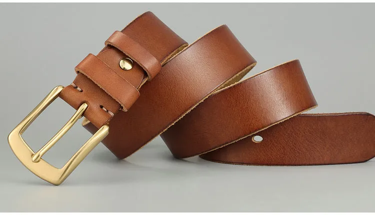 Handmade casual men's cowhide belt with needle buckle and leather decoration, black colour, on a plain background