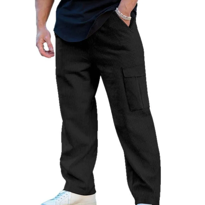 Men's navy blue corduroy wide-leg cargo trousers with a drawstring waist on a neutral background.