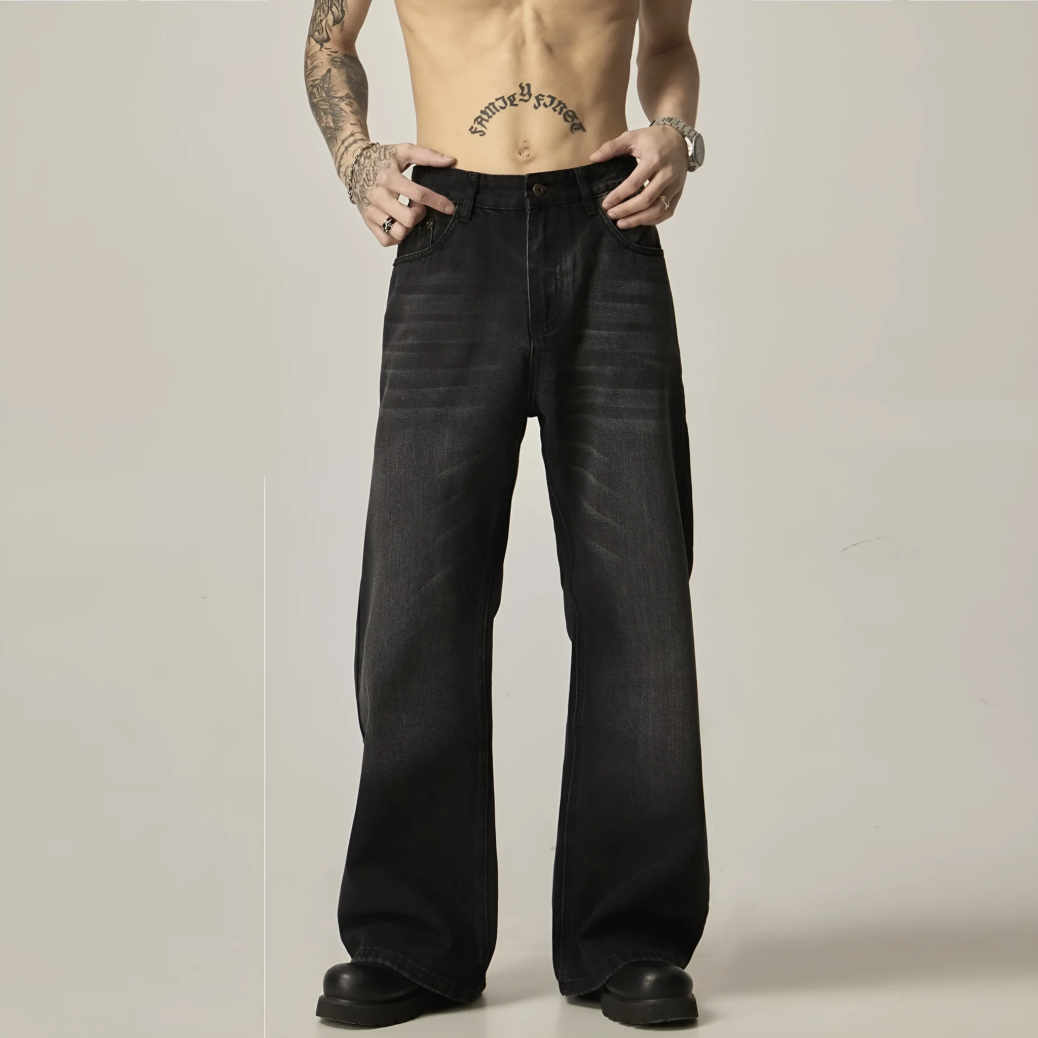 Black loose straight retro jeans showing front and back views with five-pocket design