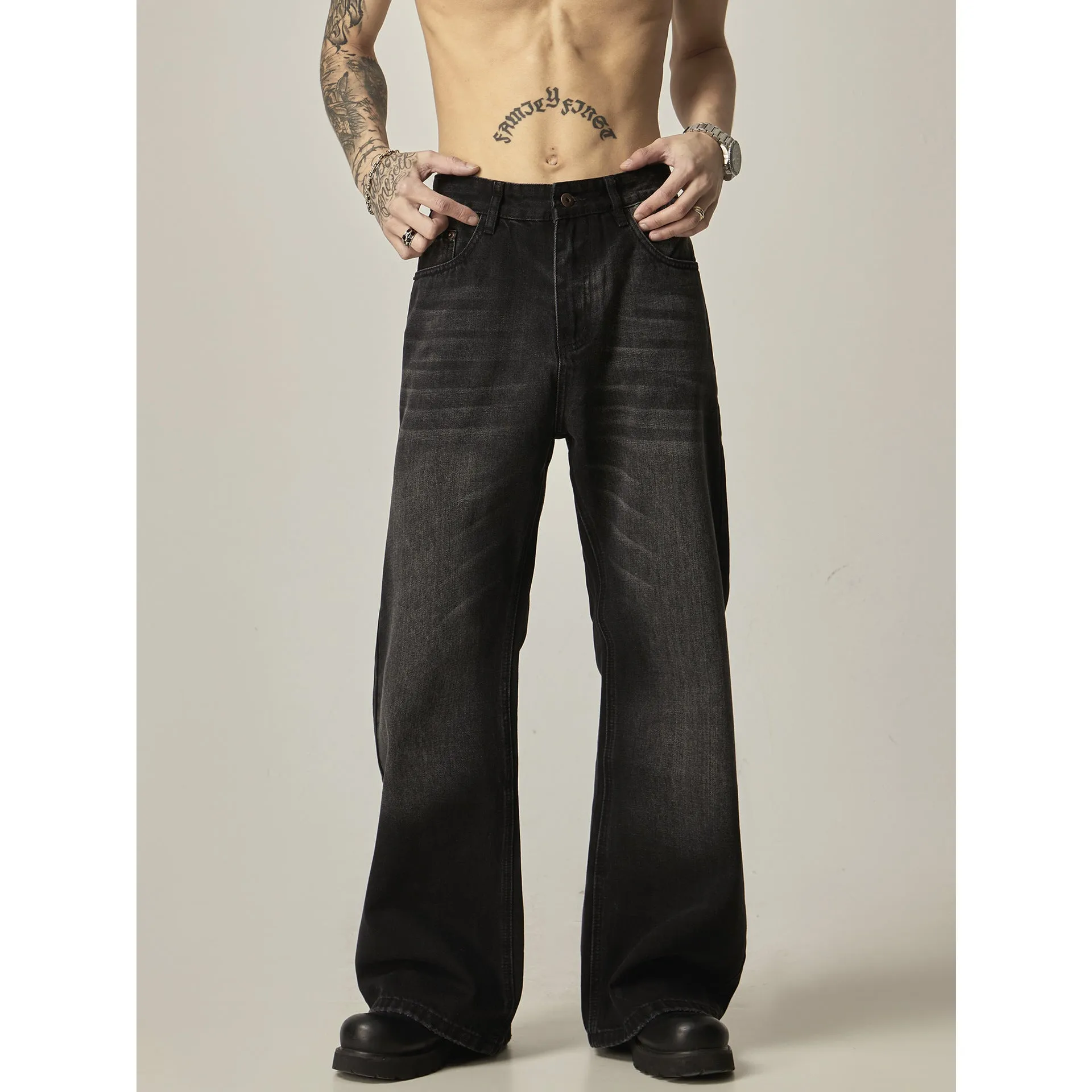Black loose straight retro jeans showing front and back views with five-pocket design