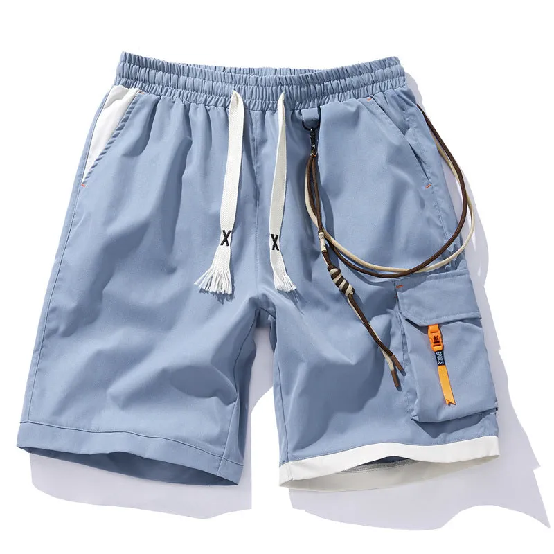 Man wearing coffee-coloured plus size bamboo fibre sports shorts with a high waist and straight leg.
