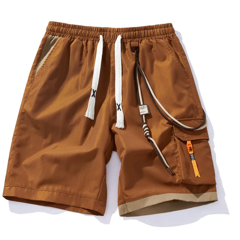 Man wearing coffee-coloured plus size bamboo fibre sports shorts with a high waist and straight leg.