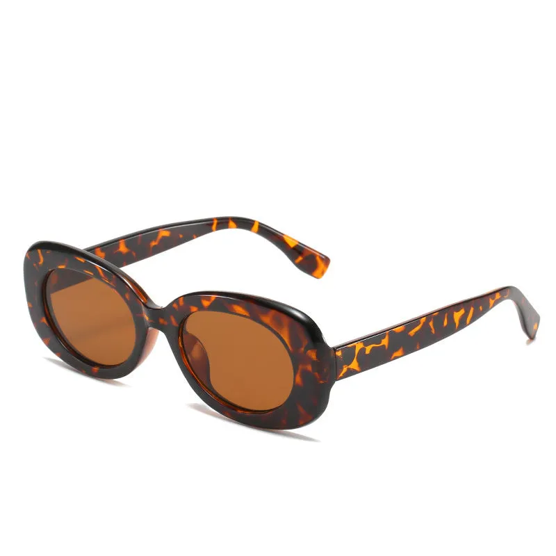 Women's oval fashion sunglasses in black with AC lens and UV400 protection PC frame