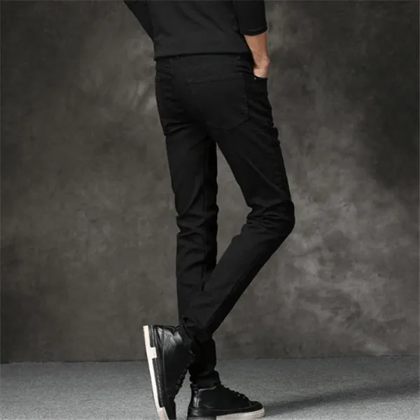 Slim-fit stretch cotton men's pants in black, laid flat showing tight cut and full length