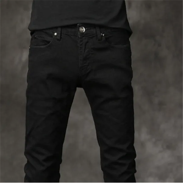 Slim-fit stretch cotton men's pants in black, laid flat showing tight cut and full length