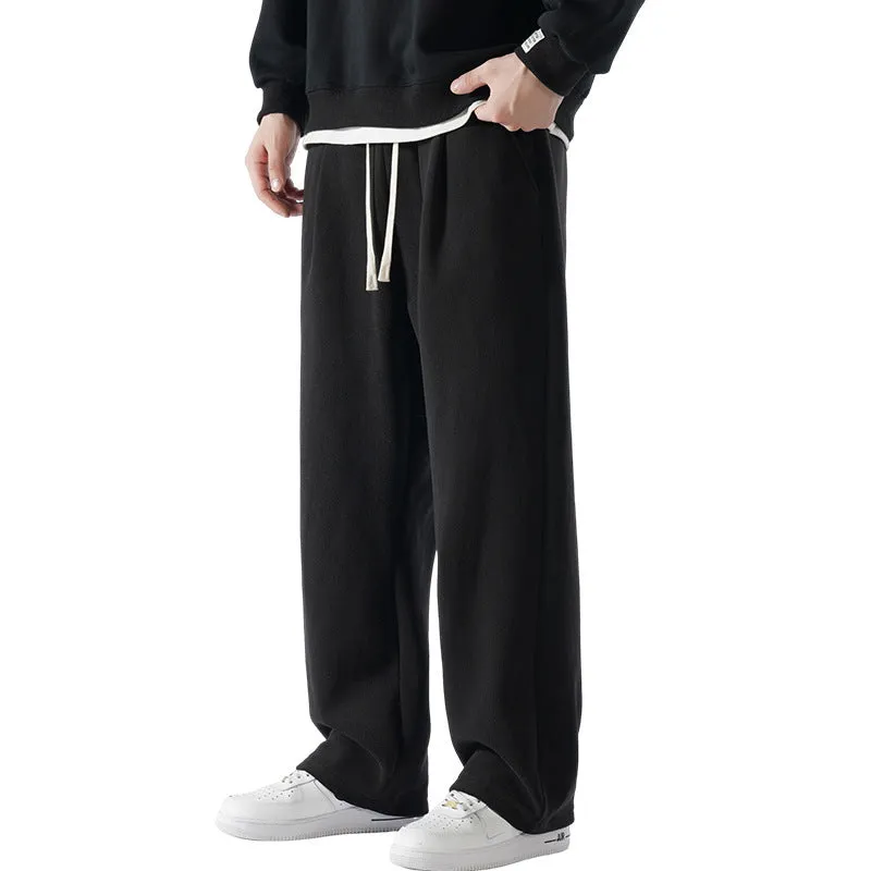 Men's apricot coloured double-sided polar fleece winter pants with a loose fit and drawstring waist.