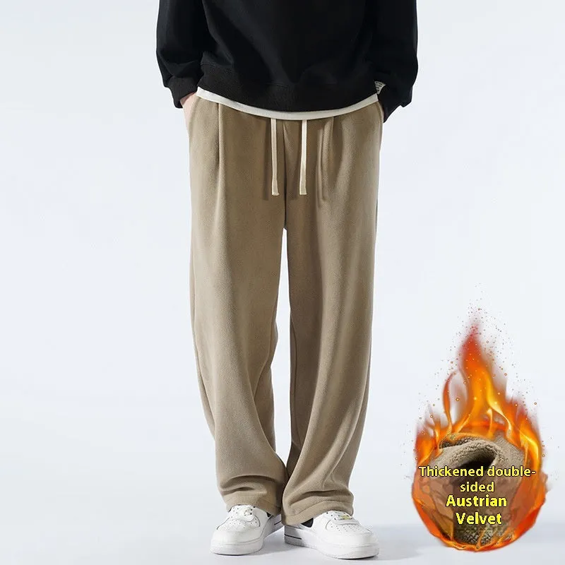 Men's apricot coloured double-sided polar fleece winter pants with a loose fit and drawstring waist.