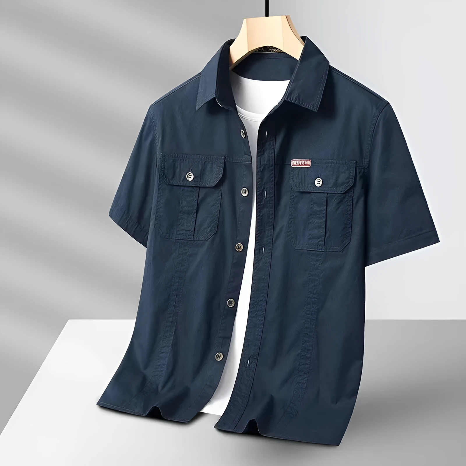 Solid colour short sleeve men's cotton blend work shirt in khaki, loose cardigan fit with non-iron finish