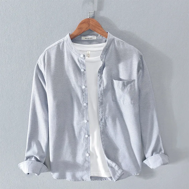 Fashion stand-up collar solid colour long-sleeved cotton linen blend shirt in black, shown on model
