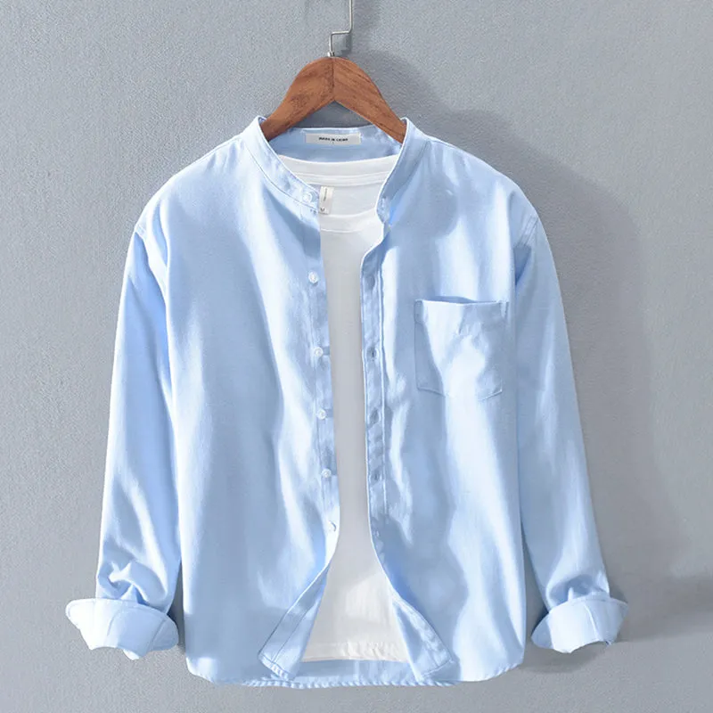 Fashion stand-up collar solid colour long-sleeved cotton linen blend shirt in black, shown on model