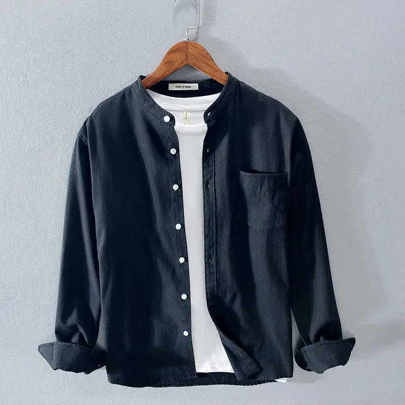 Fashion stand-up collar solid colour long-sleeved cotton linen blend shirt in black, shown on model