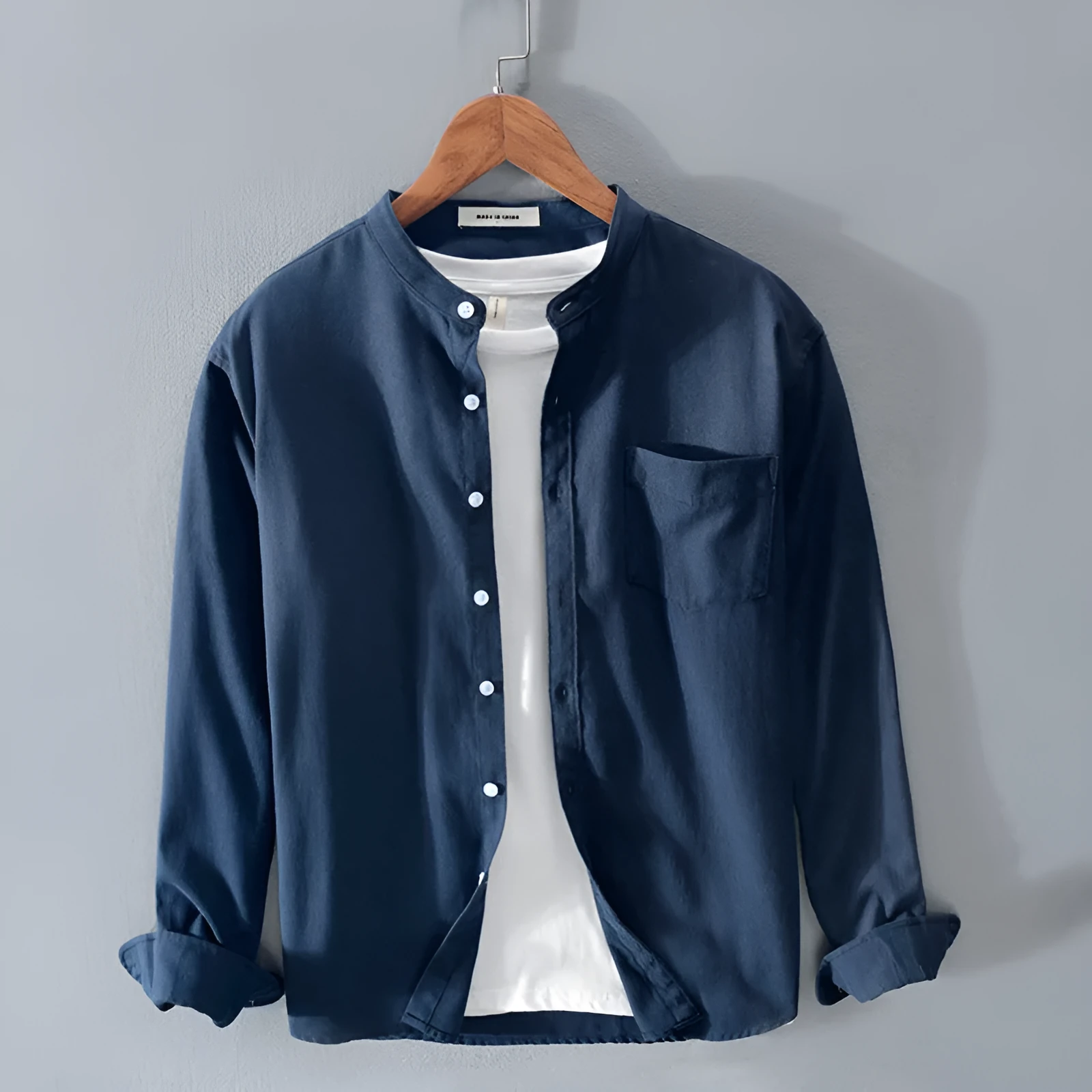 Fashion stand-up collar solid colour long-sleeved cotton linen blend shirt in black, shown on model