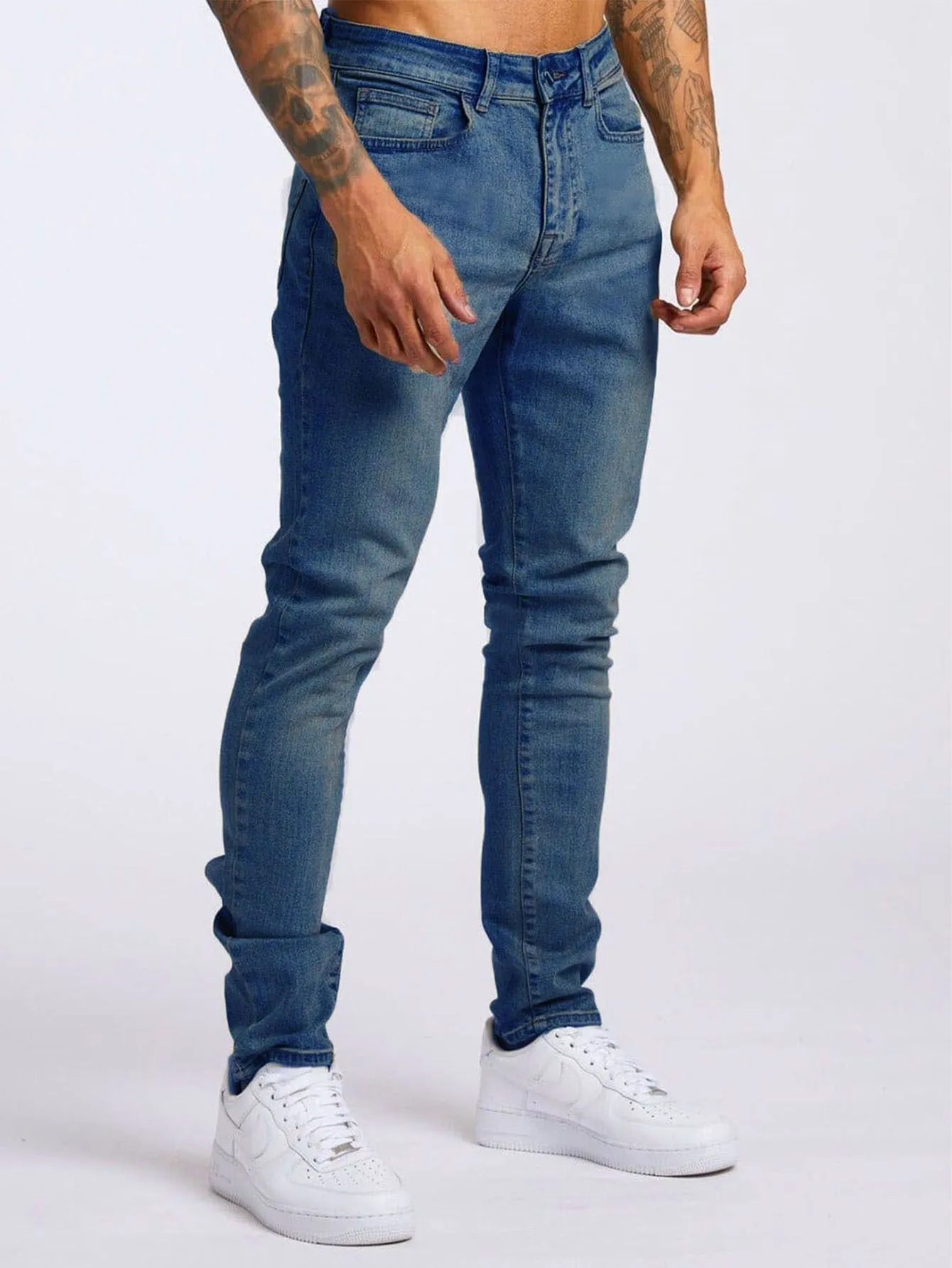Men's fashion casual slim fit high waist jeans in light blue cotton with solid colour finish