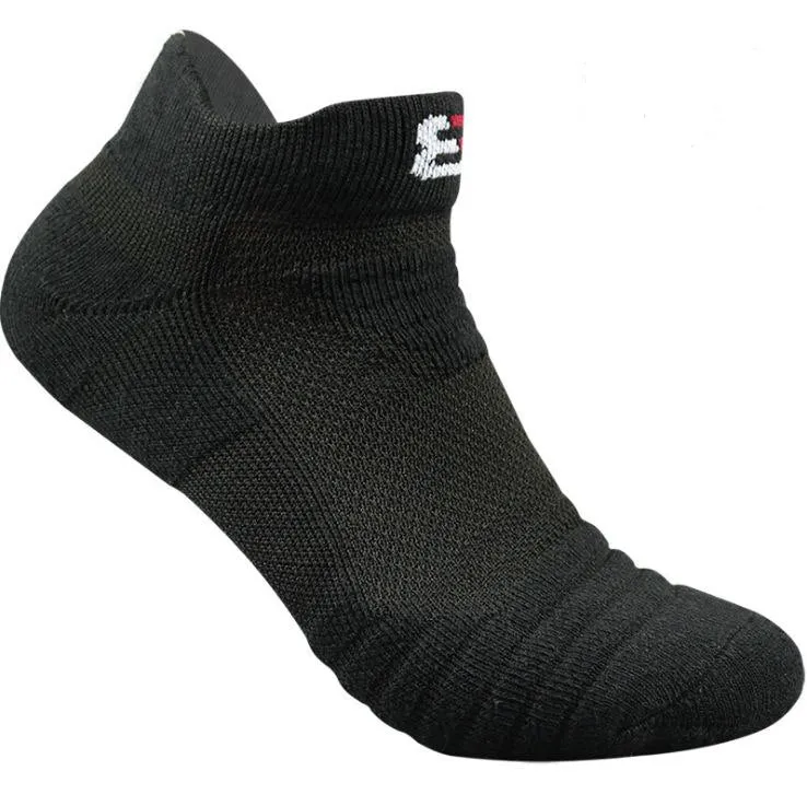 Three pairs of plain colour cotton blend socks in black, white, and grey