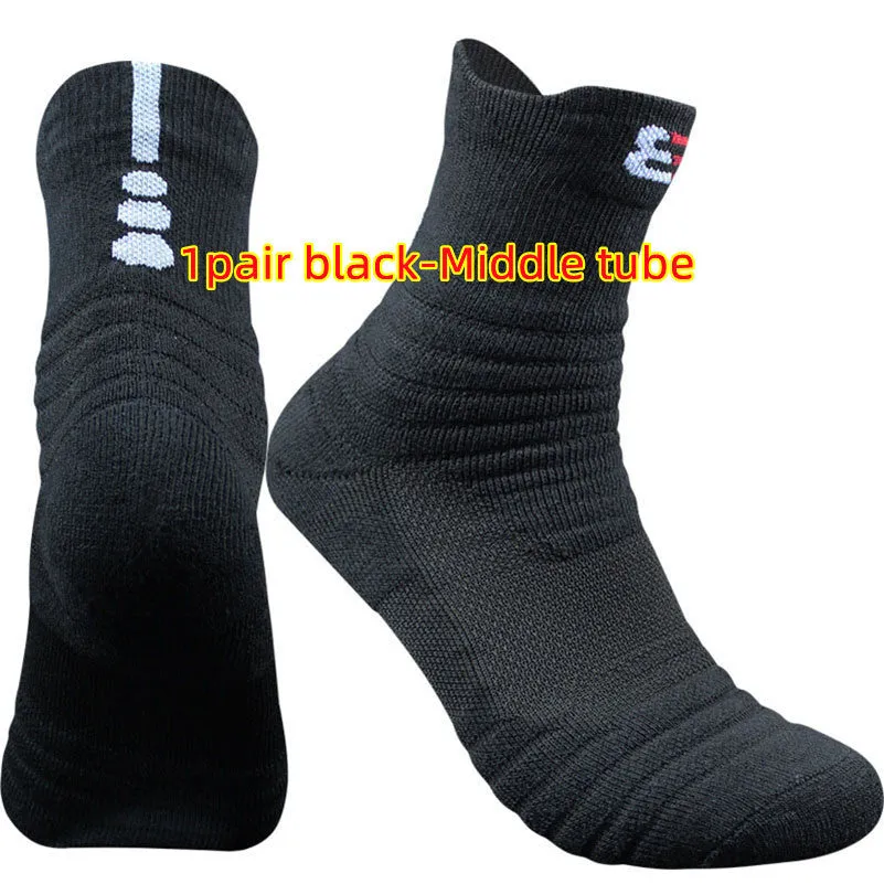 Three pairs of plain colour cotton blend socks in black, white, and grey