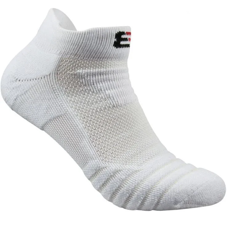 Three pairs of plain colour cotton blend socks in black, white, and grey