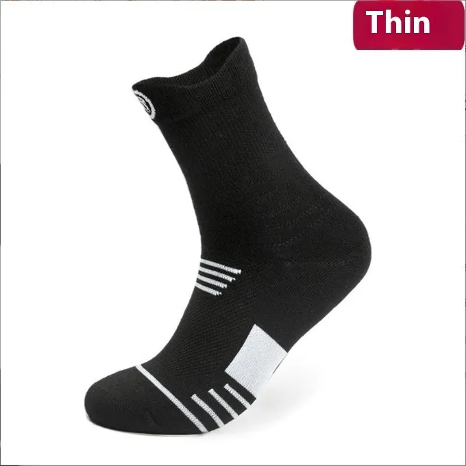 Three pairs of plain colour cotton blend socks in black, white, and grey