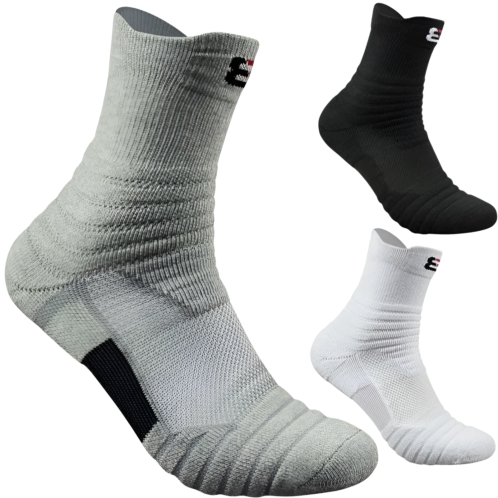 Three pairs of plain colour cotton blend socks in black, white, and grey
