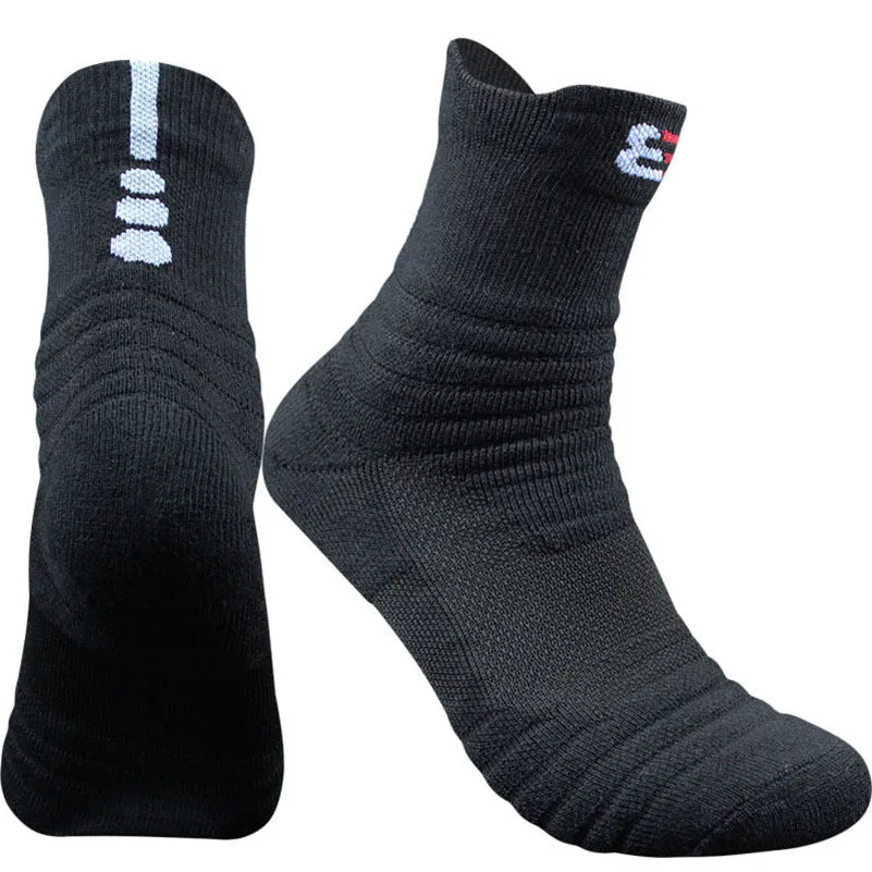 Three pairs of plain colour cotton blend socks in black, white, and grey