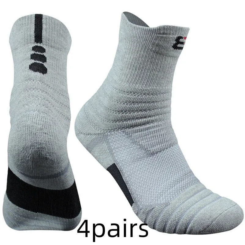 Three pairs of plain colour cotton blend socks in black, white, and grey