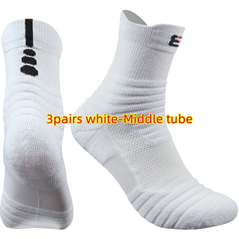 Three pairs of plain colour cotton blend socks in black, white, and grey