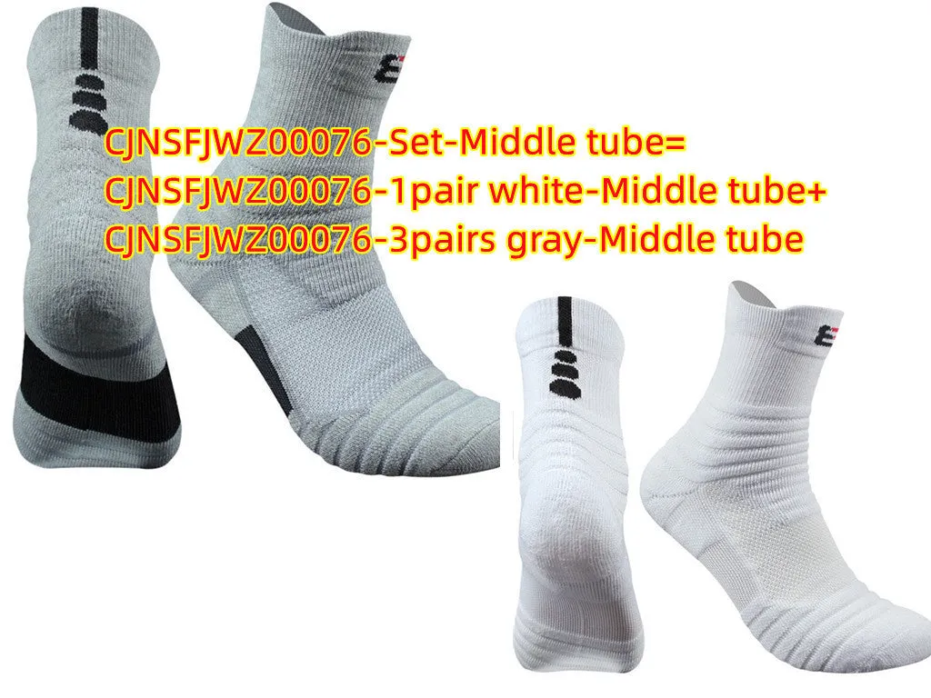 Three pairs of plain colour cotton blend socks in black, white, and grey